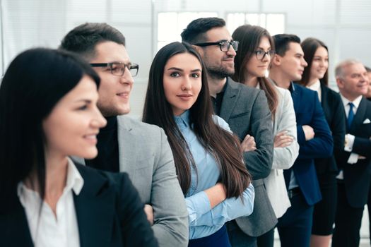 close up. professional team of business people standing together. the concept of teamwork