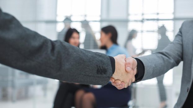 close up. business handshake on office background . success concept