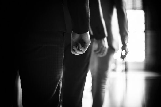close up. office employees passing through the office. business concept