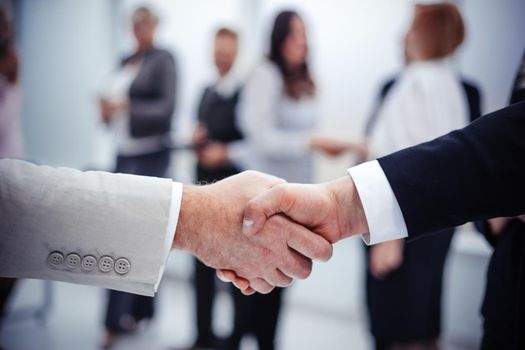 close up. business handshake on office background. concept of partnership