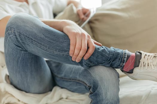 close up. young man relaxing sitting on the couch