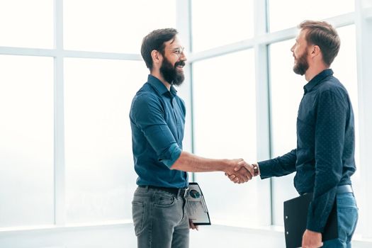 business people shaking hands before starting a business meeting. concept of cooperation