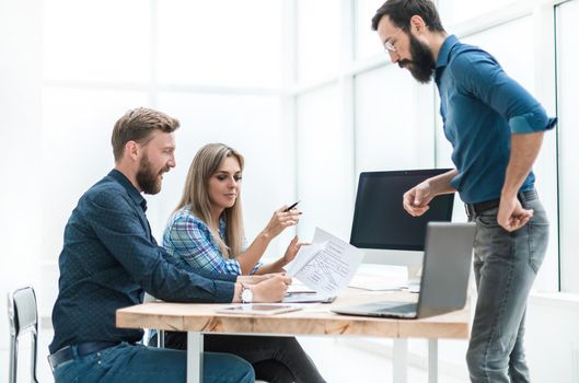 group of business people discussing something near the office Desk . photo with copy space
