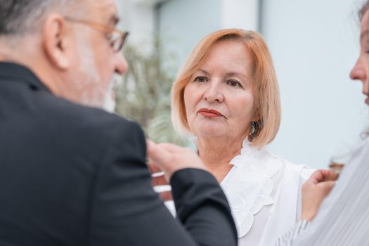 close up. serious business colleagues talking about something in the office. office weekdays