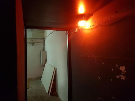 burning light in the room in the underground style. photo with copy space