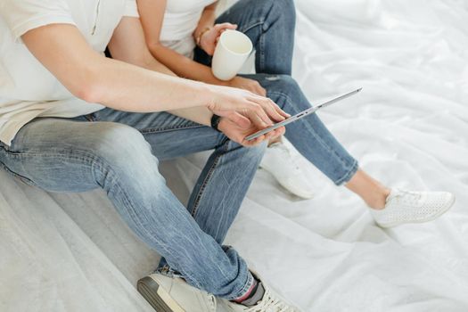 close up. young couple making online purchases in their apartment