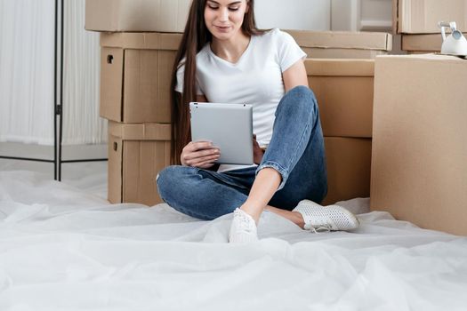 close up. young woman making online purchases for her new apartment