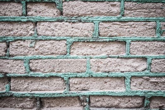 close up. fragment of an old brick wall. background and texture