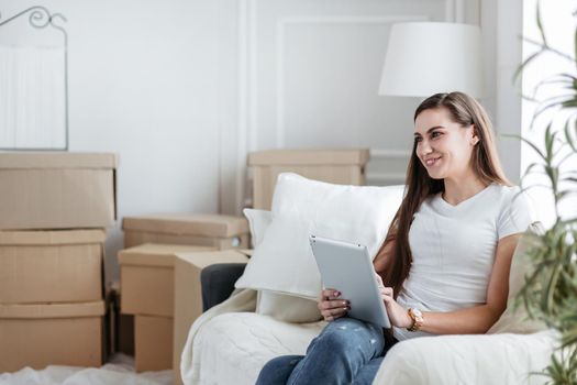 close up. young woman with digital tablet making online purchases
