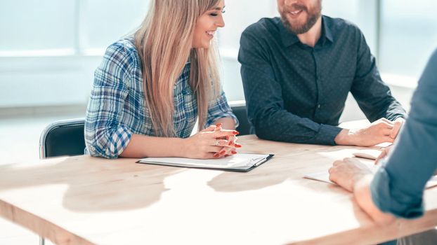 group of business people sitting at the office table. the concept of employment