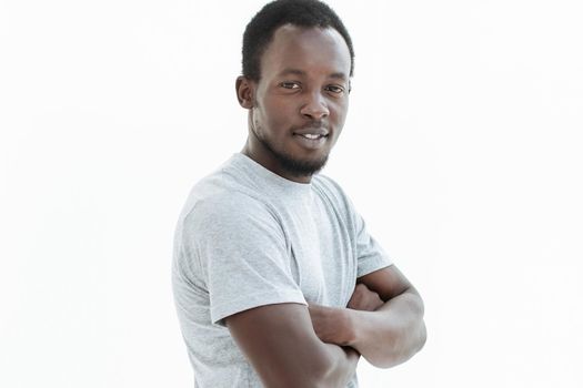 side view. confident guy looking at the camera. isolated on white background