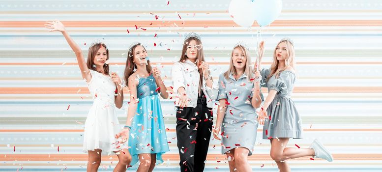 Cheerful teenage girls at birthday party