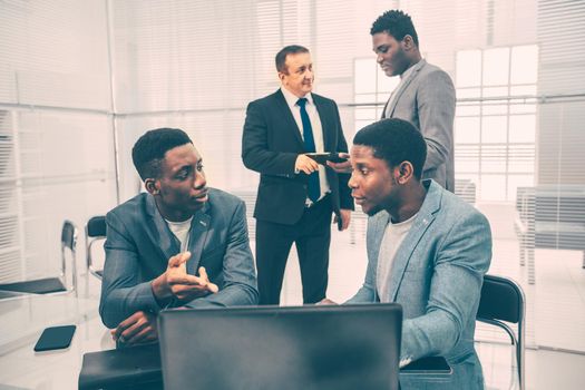 multinational business team works in the office. office workdays