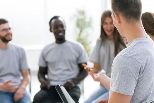 close up. a group of young people sitting in the conference room. business and education