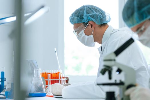 close up. group of scientists analyzing tests in the laboratory. photo with a copy-space.