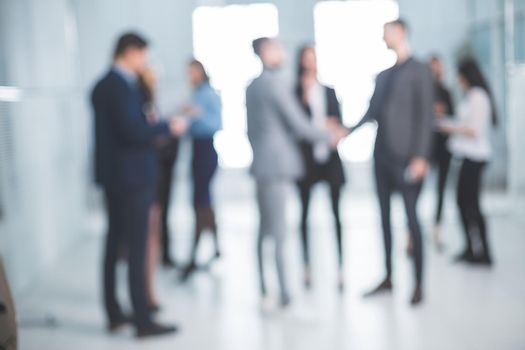 background image of a group of business people in the office lobby. business background