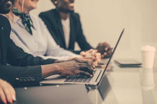 background image of a group of employees in the workplace. photo with copy-space