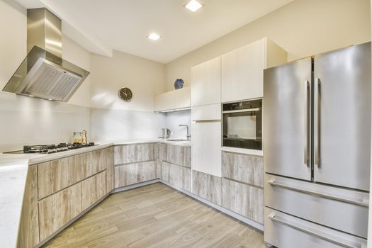 The interior of an elegant chic kitchen designed with taste