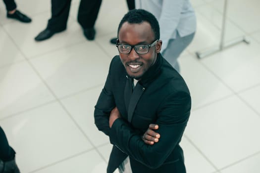 top view. smiling young businessman looking at the camera