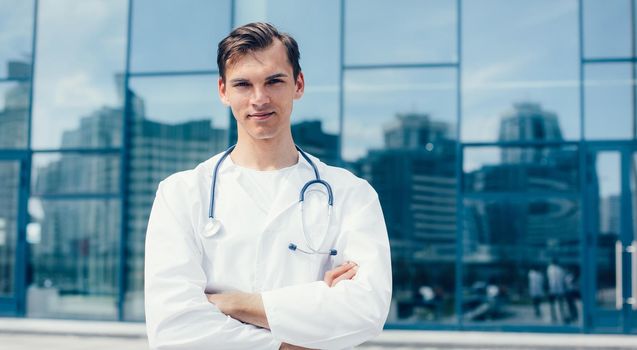 close up. ambulance doctor standing on a city street. photo with a copy-space.