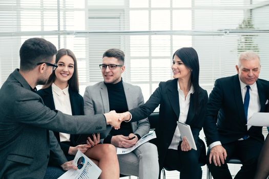 business colleagues greet each other in the conference room. concept of cooperation