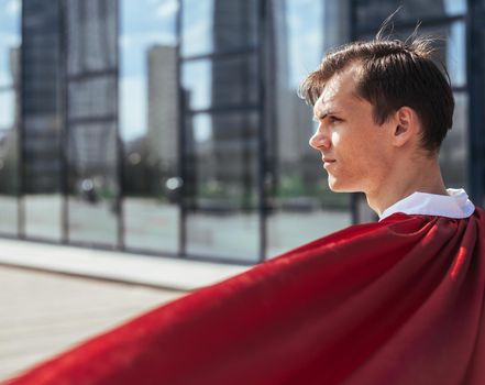 close up. superhero doctor looking at a city street. photo with a copy of the space.
