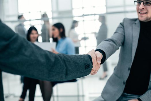 close up. business handshake on office background . success concept