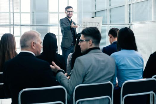 rear view. business people sitting in the conference room. business and education