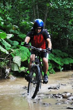 healthy lifestyle and fitness concept with mount bike man outdoor