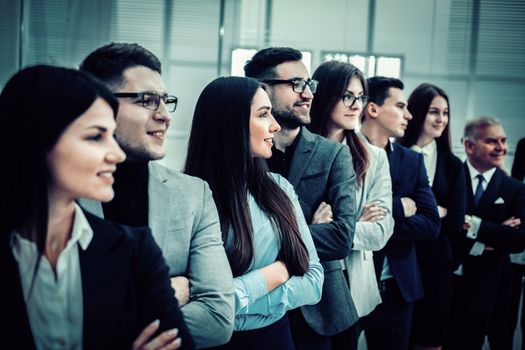 close up. professional team of business people standing together. the concept of teamwork