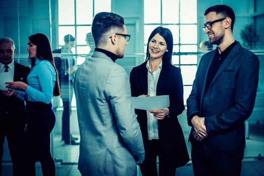 group of business people standing in the office lobby. business concept