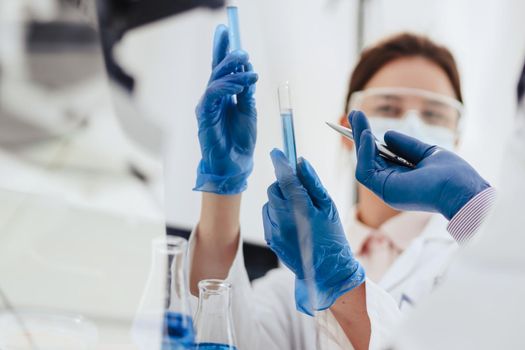 close up. happy scientist is satisfied with the results of the research. science and health.
