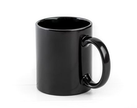 Totally black ceramic cup isolated on white background
