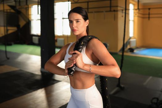 Sporty woman resting, having break after doing exercise