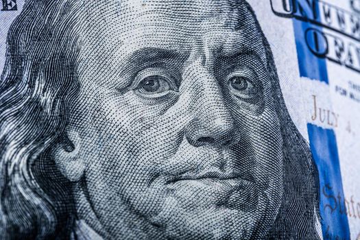 Portrait of Benjamin Franklin on one hundred dollar bill
