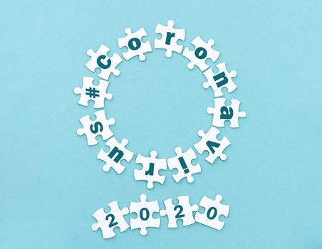 Top view of puzzle pieces coronavirus 2020