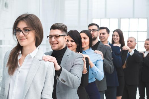 group of young business people standing behind each other. the concept of teamwork