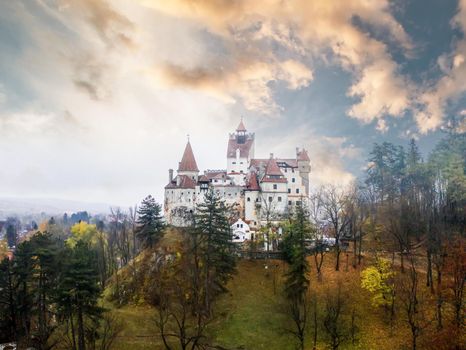 Panoramic view of mysterious Bran Castle in Romania at sunset