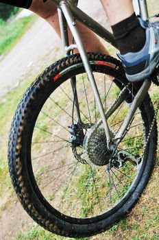 healthy lifestyle and fitness concept with mount bike man outdoor