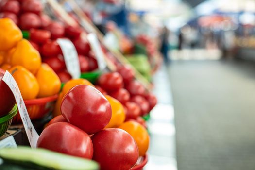 Close up of colorful array of vegetables at a fresh food market. Market and trade concept