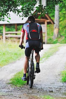 healthy lifestyle and fitness concept with mount bike man outdoor