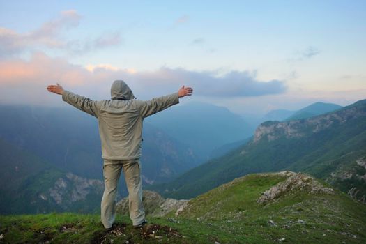 healthy young man practice youga in height mountain at early morning and sunrise