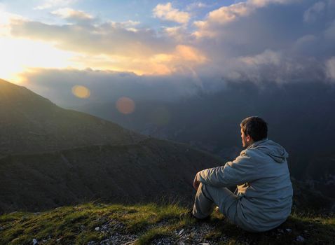 healthy young man practice youga in height mountain at early morning and sunrise