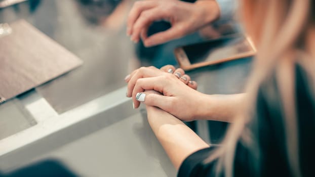 close up. image of a successful business woman sitting at an office Desk. business background