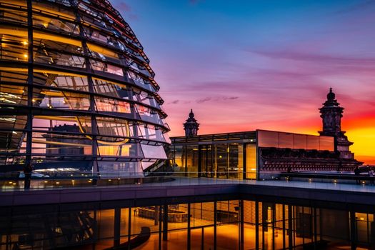 Reichstag large glass dome and roof terrace at sunset