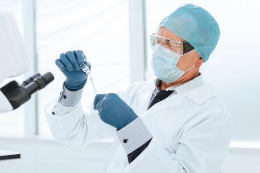 close up. scientist pharmacist works in a laboratory . photo with a copy-space.