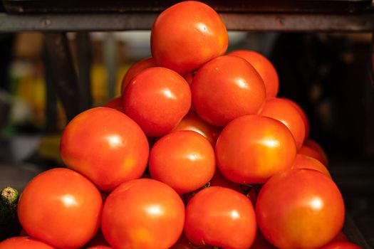 Beautiful picture of red tomatoes sold on the market