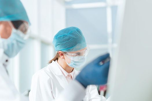 close up. scientists conduct testing in a modern laboratory. science and health.