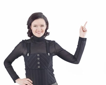 photo in full growth.side view. business woman showing a point on a blank screen.