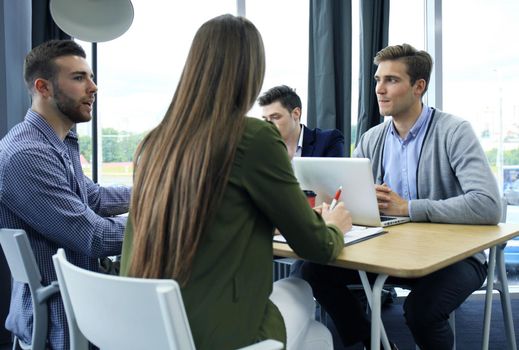 Group of young business people and designers.They working on new project.Startup concept.